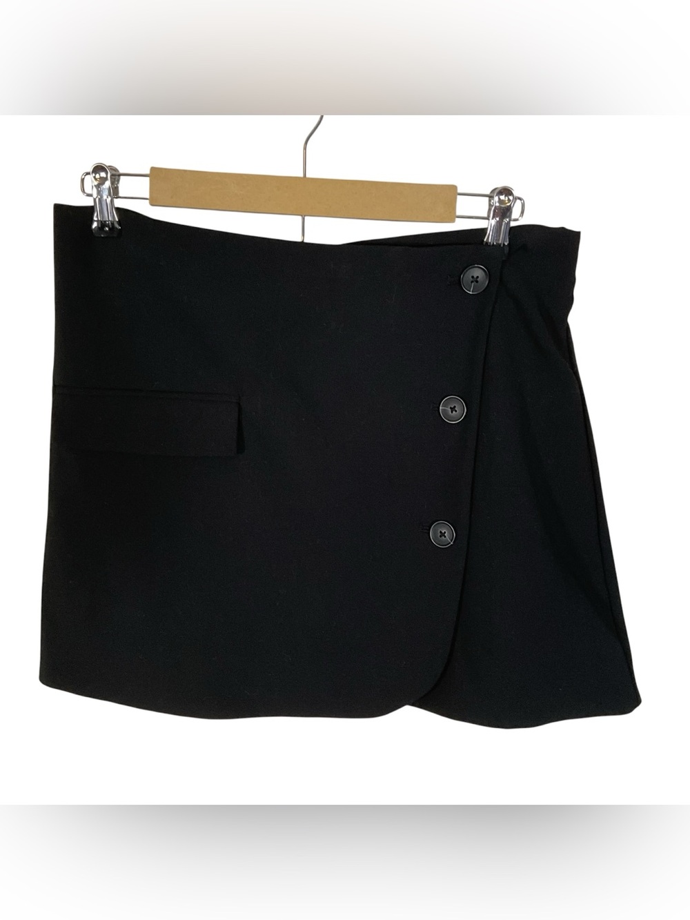 A new day Women’s Black Wrap Mini Skirt With Side Button Opening. Size 10